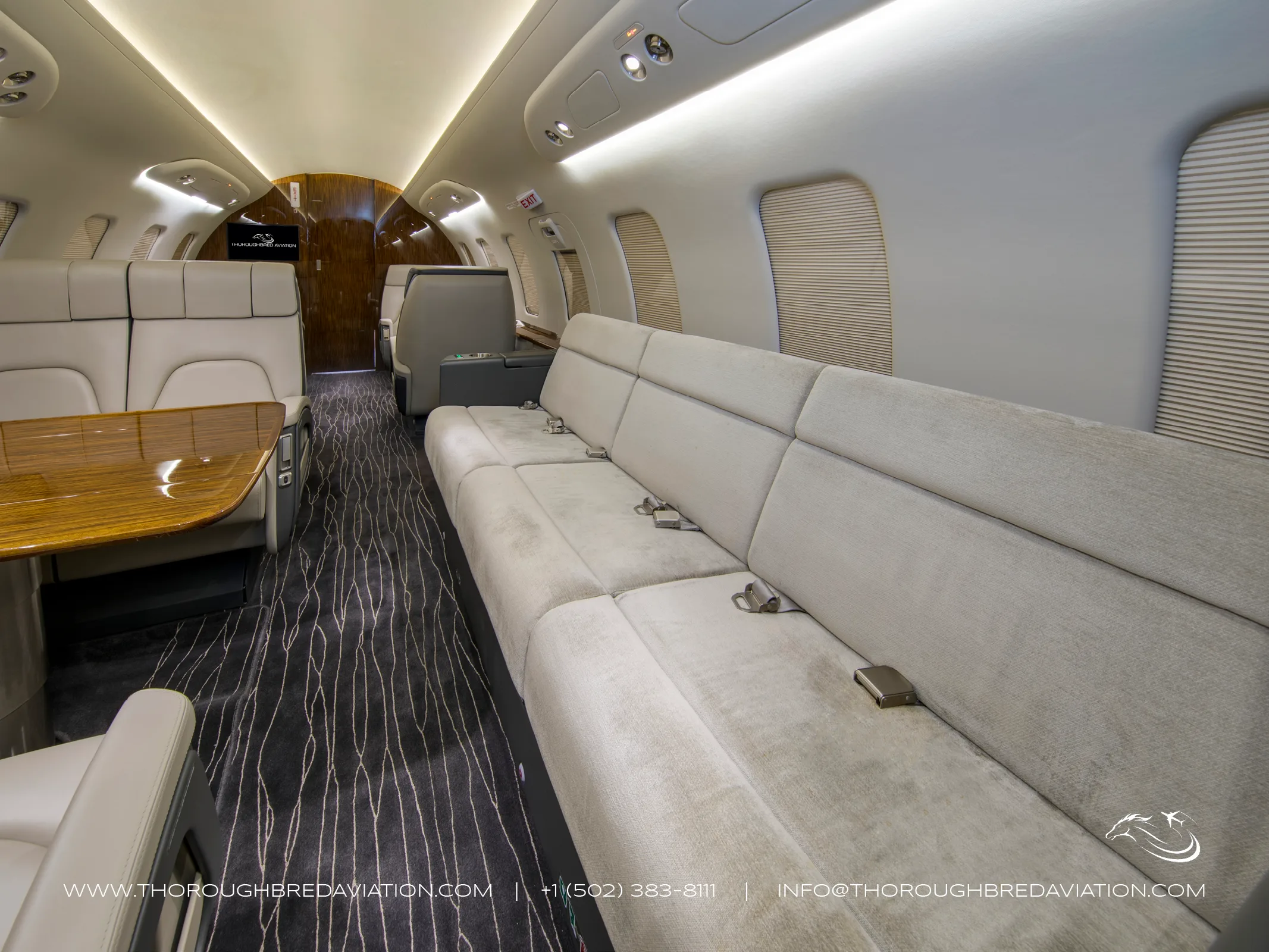 Cabin interior of a 2018 Bombardier Challenger 650 — Thoroughbred Aviation.