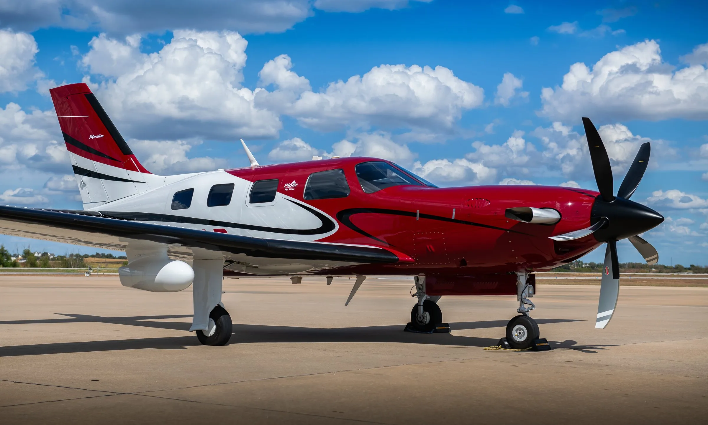 Exterior view of a 2010 Piper PA46-500TP Meridian, N203AP.