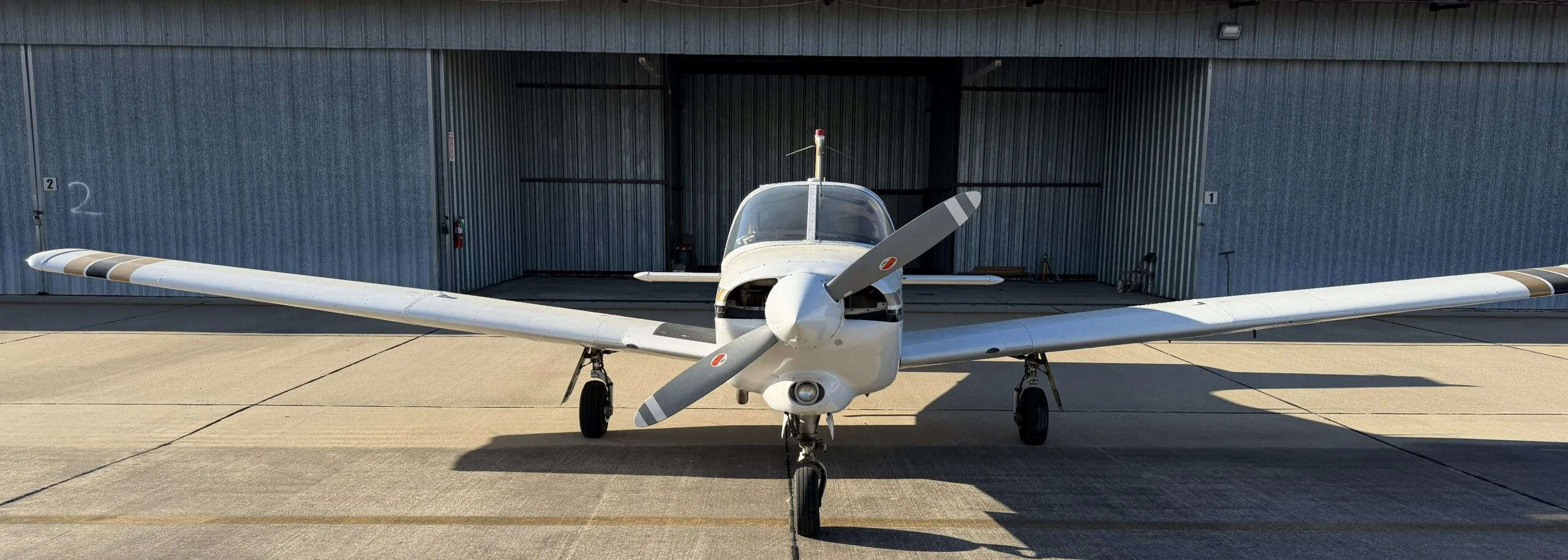 Exterior view of a 1977 Piper Turbo Arrow III, N38981.
