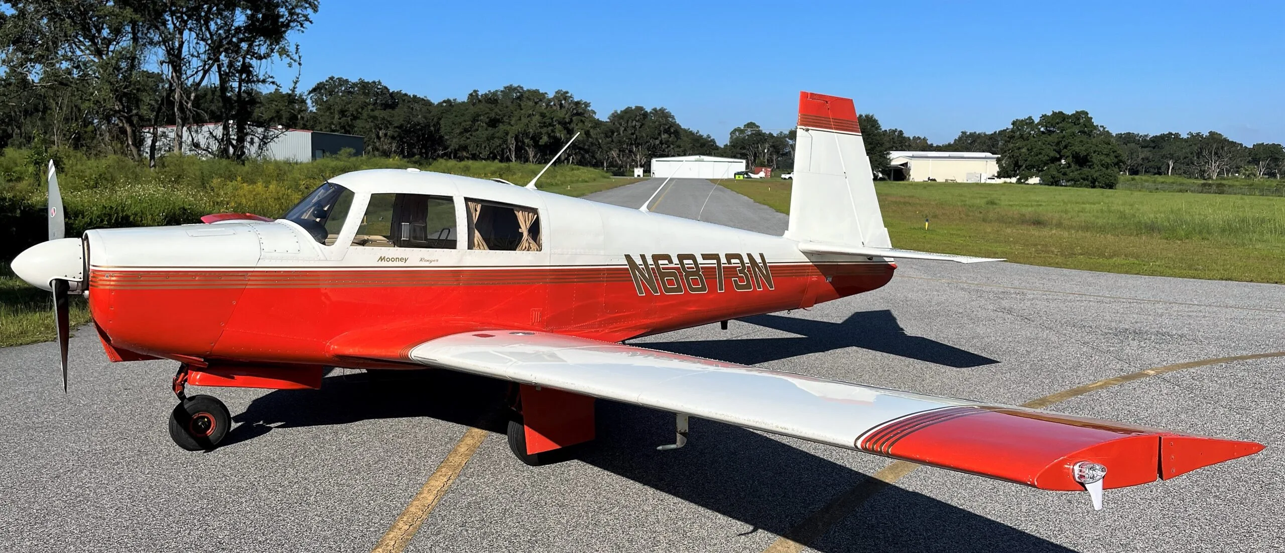 Exterior view of a 1968 Mooney M20C Ranger, N6873N.
