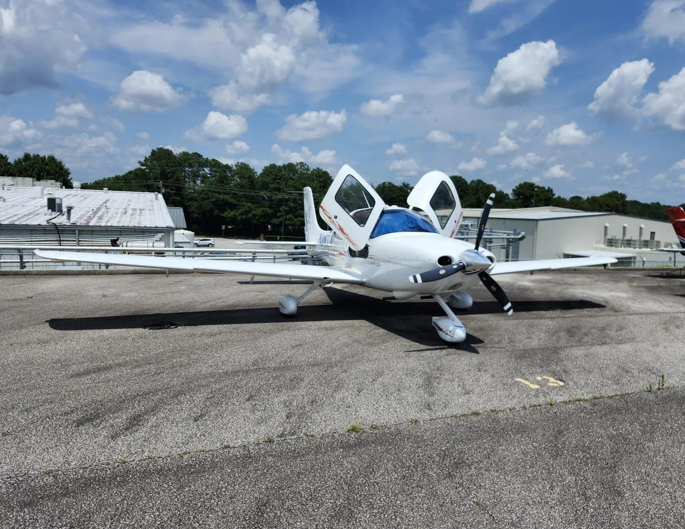Exterior view of a 2006 Cirrus SR20 For Flight School Leaseback, N215SR.