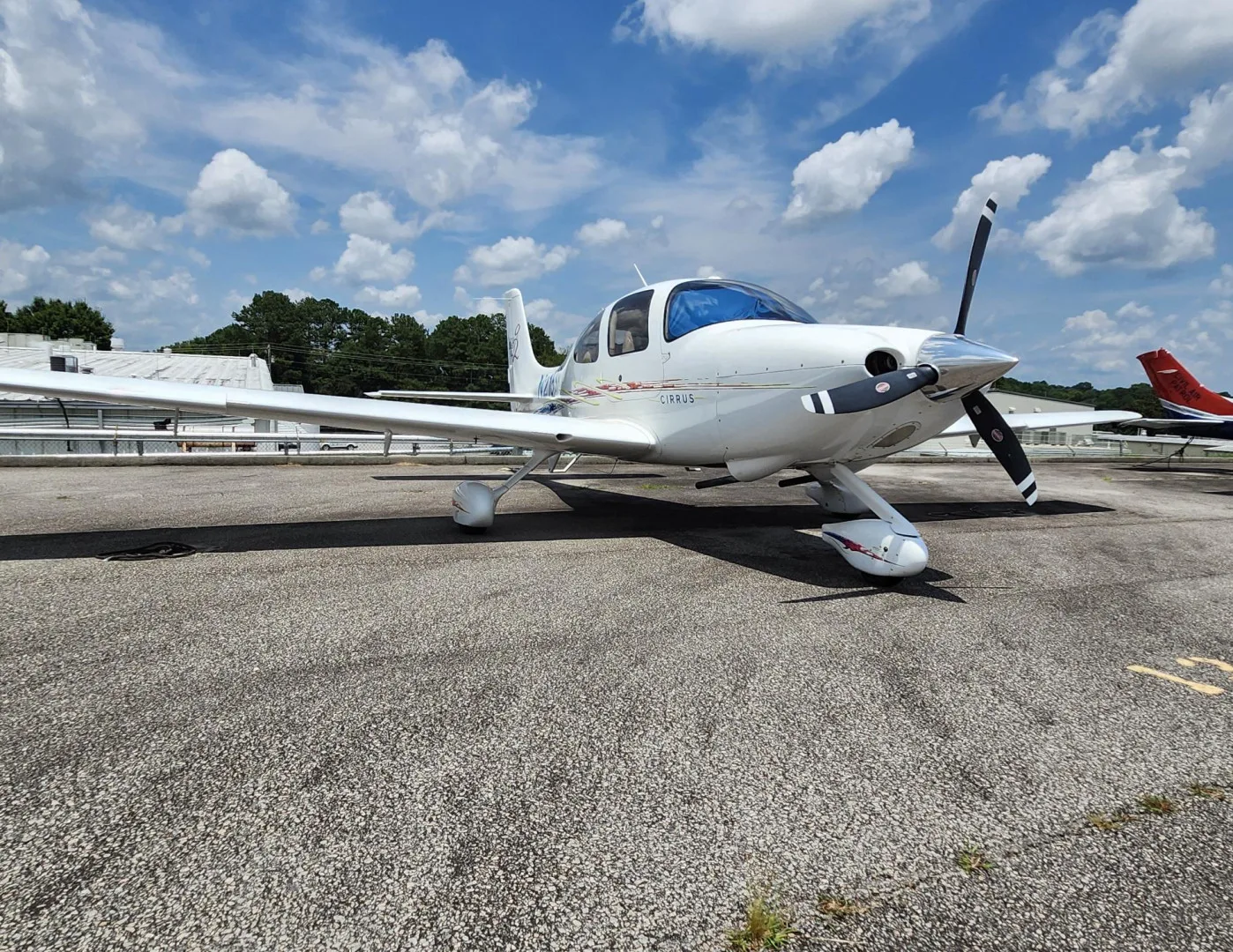 Exterior view of a 2006 Cirrus SR20 For Flight School Leaseback, N215SR.
