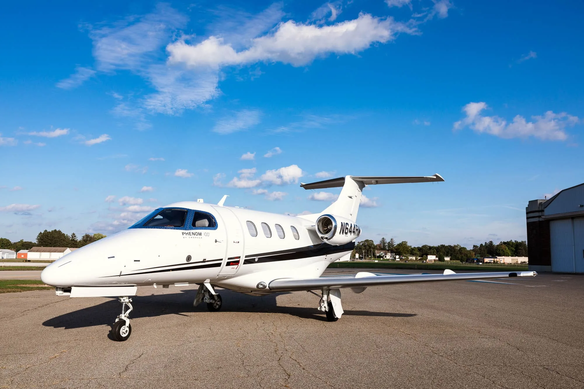 Exterior view of a 2009 Embraer Phenom 100, N644RM.