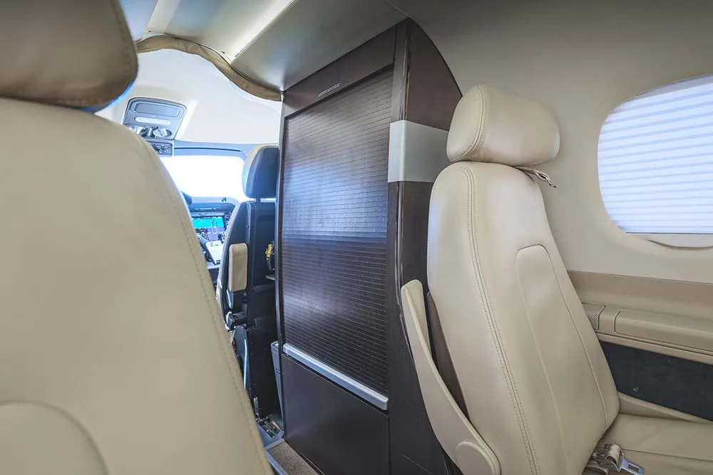 Cabin interior of a 2010 Embraer Phenom 100.