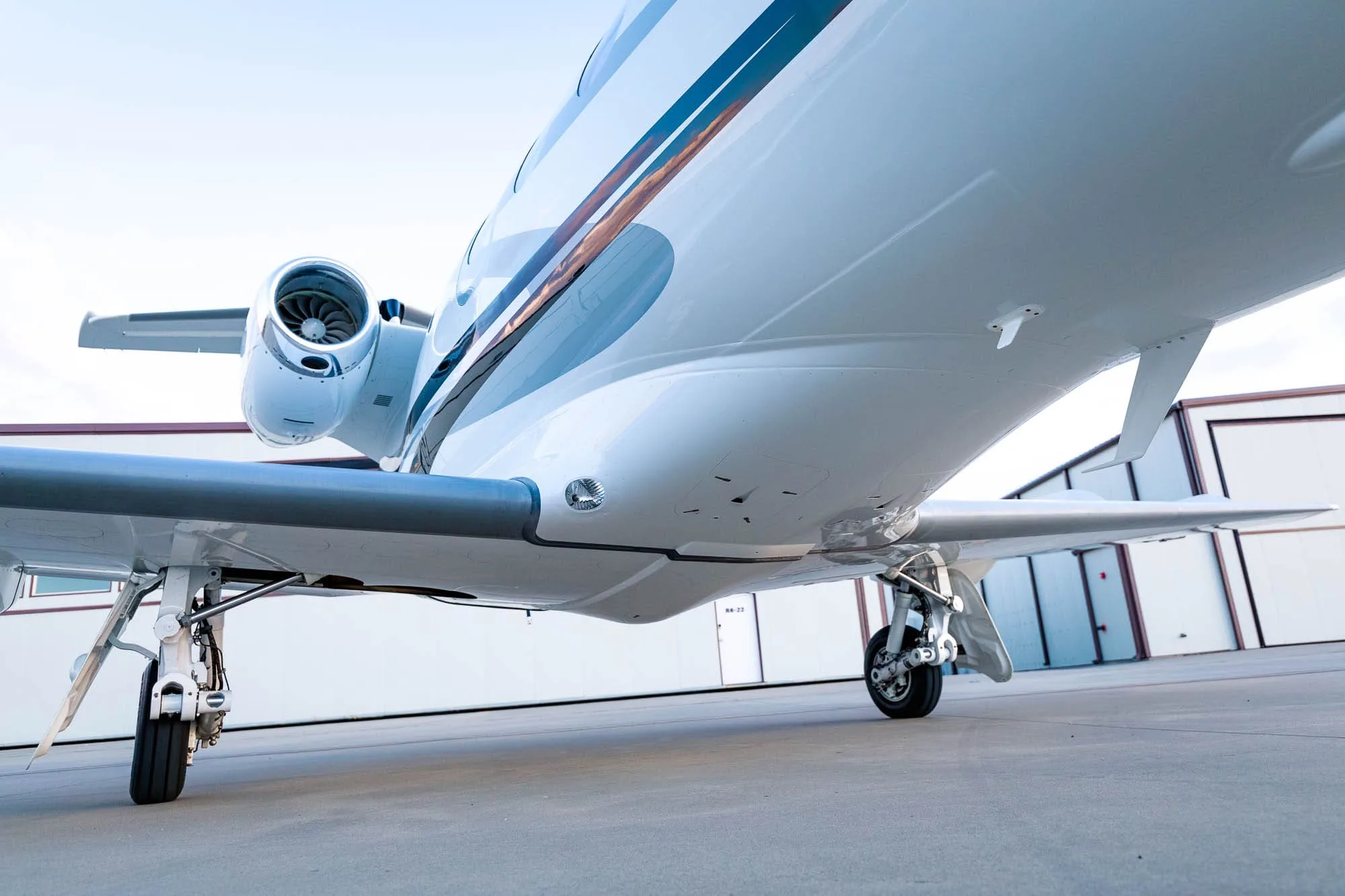 Exterior view of a 2011 Embraer Phenom 100, N751VL.