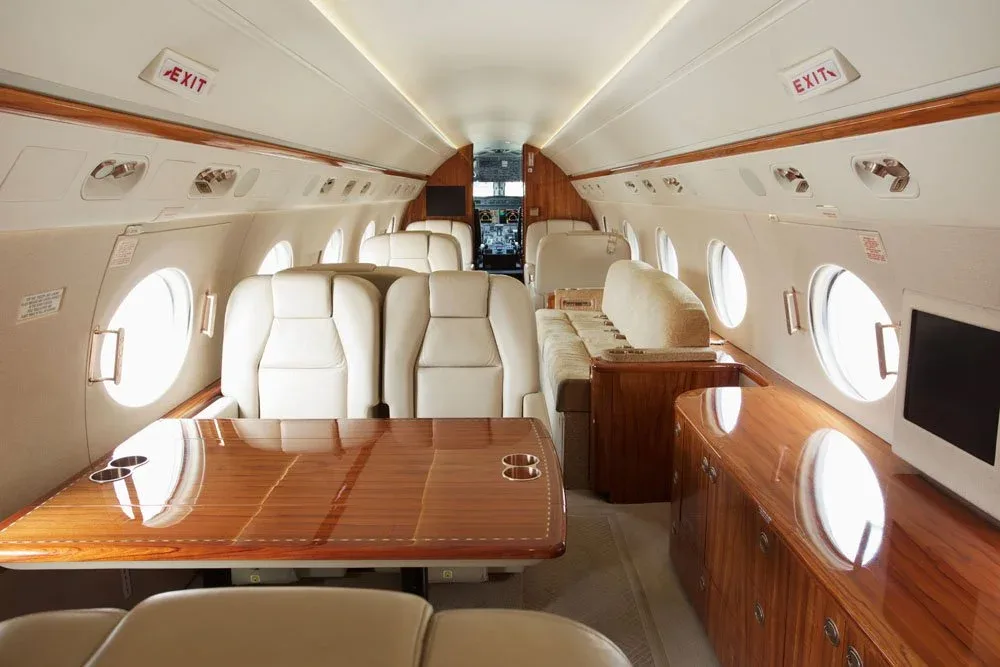 Cabin interior of a 2010 Gulfstream 450 - N908CC — | WCAS.