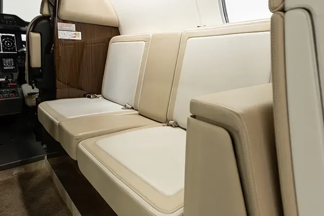 Cabin interior of a 2018 Embraer Phenom 300E.