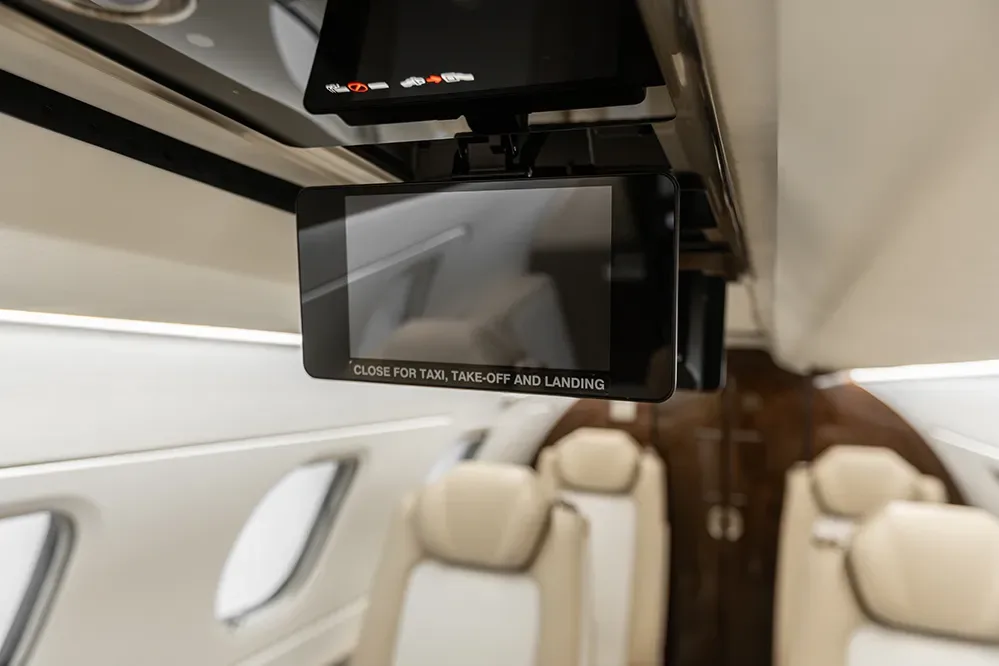 Cabin interior of a 2018 Embraer Phenom 300E.