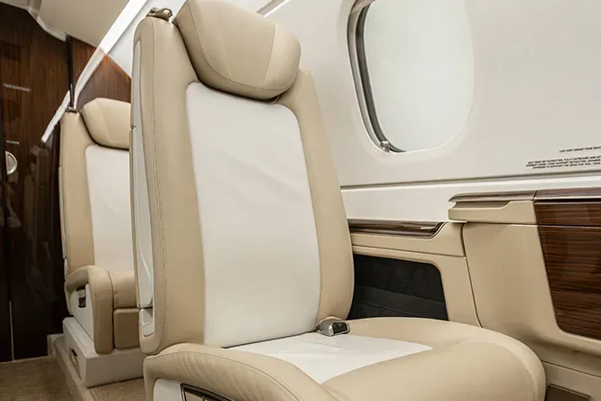 Cabin interior of a 2018 Embraer Phenom 300E.