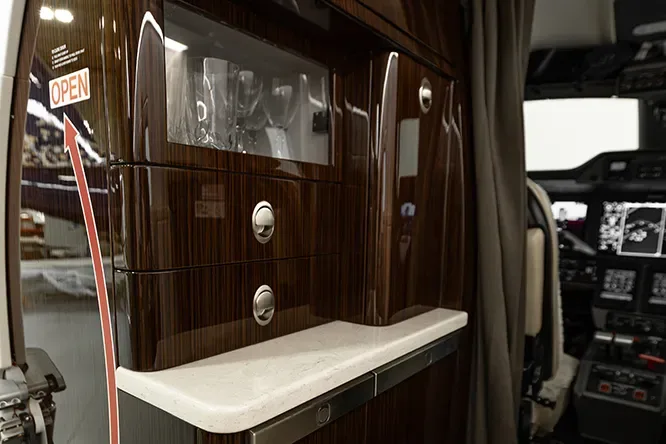 Cabin interior of a 2018 Embraer Phenom 300E.