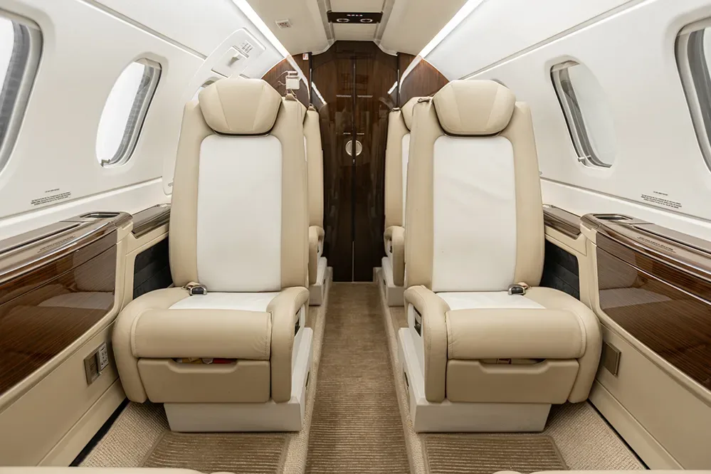 Cabin interior of a 2018 Embraer Phenom 300E.