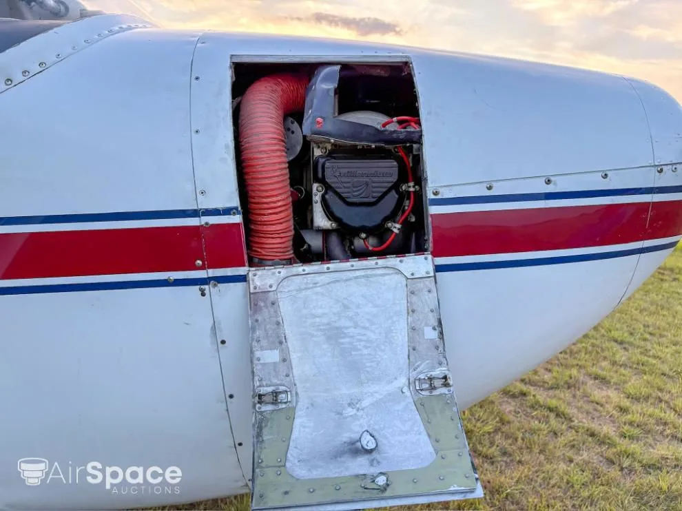 Engine detail of a 1956 Cessna 180A Skywagon.