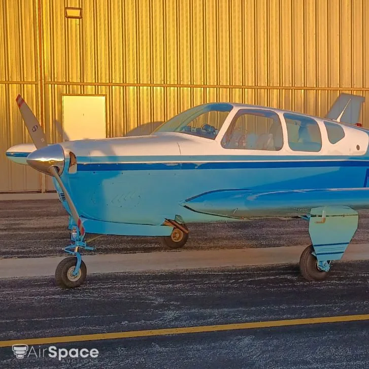 Exterior view of a 1960 Beechcraft 35 Bonanza.