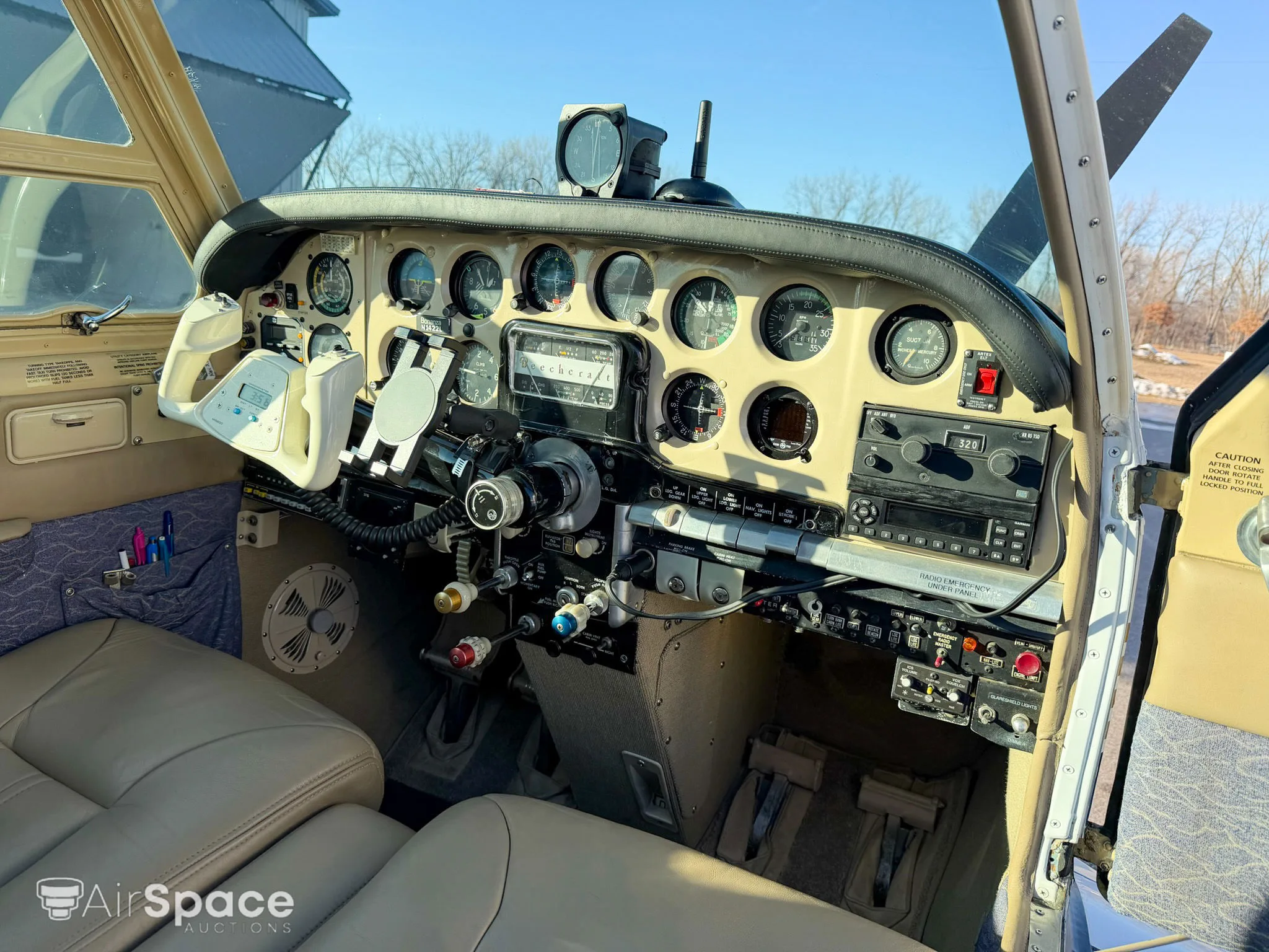 Cockpit and instrument panel of a 1961 Beechcraft N35 Bonanza.
