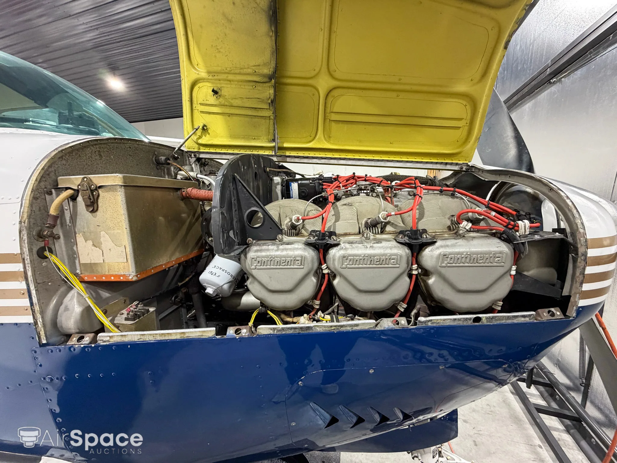 Engine detail of a 1961 Beechcraft N35 Bonanza.