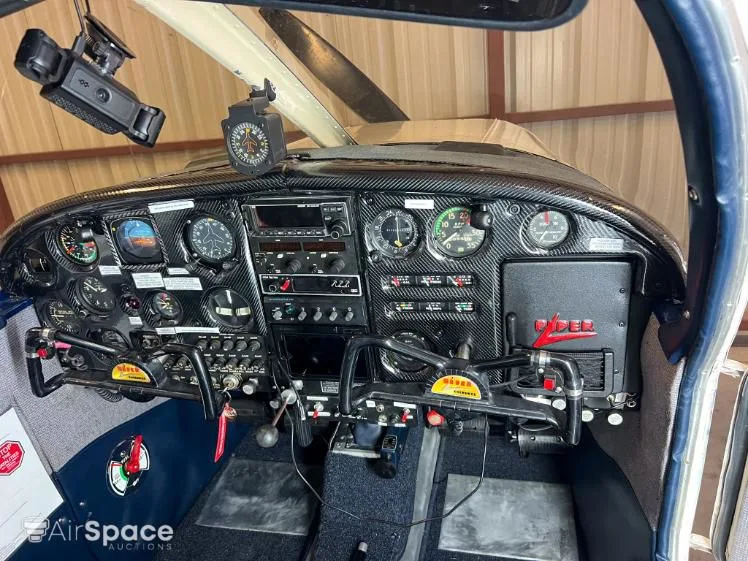 Cockpit and instrument panel of a 1963 Piper PA-28-140 Cherokee.