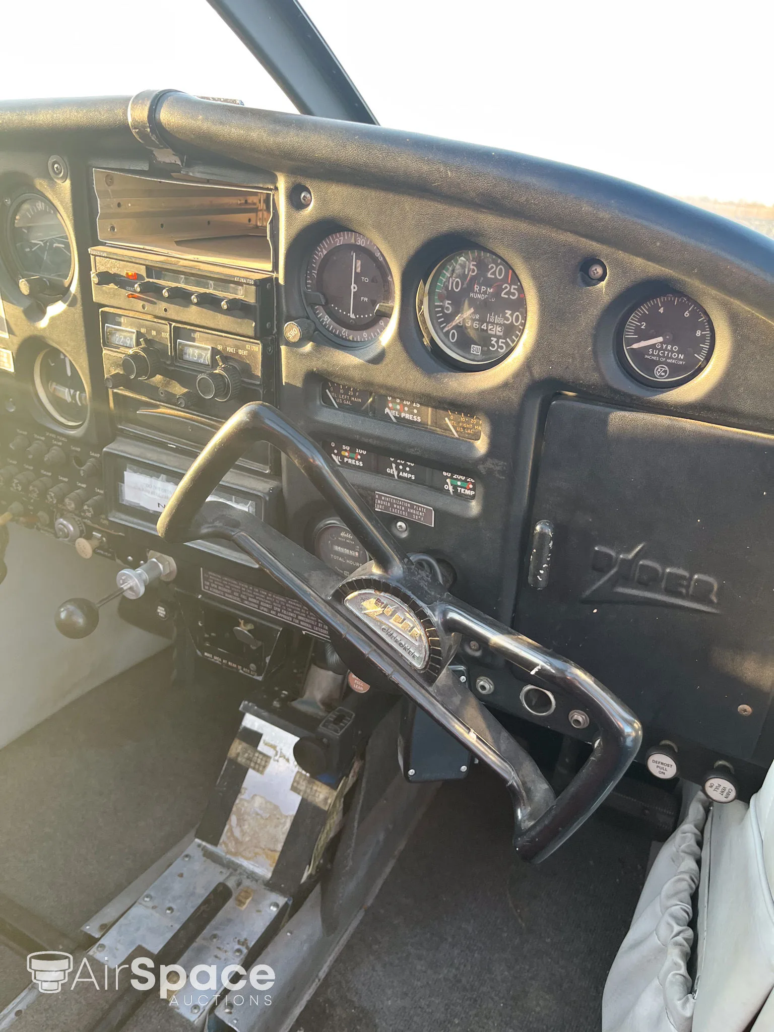 Cockpit and instrument panel of a 1964 Piper PA-28-140 Cherokee.