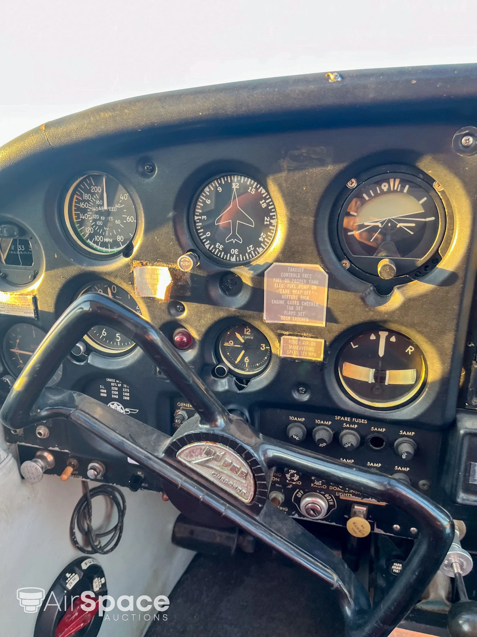 Cockpit and instrument panel of a 1964 Piper PA-28-140 Cherokee.
