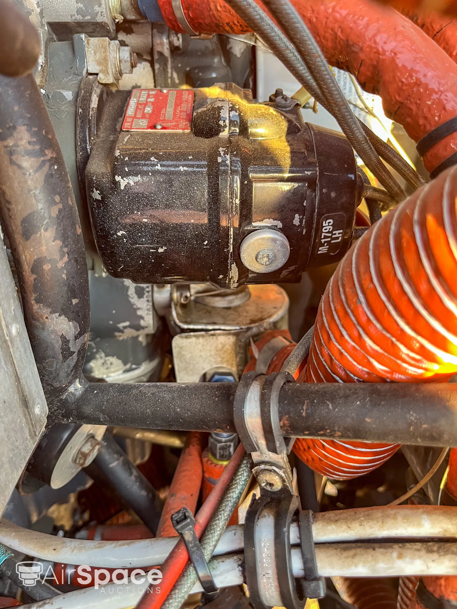 Engine detail of a 1964 Piper PA-28-140 Cherokee.