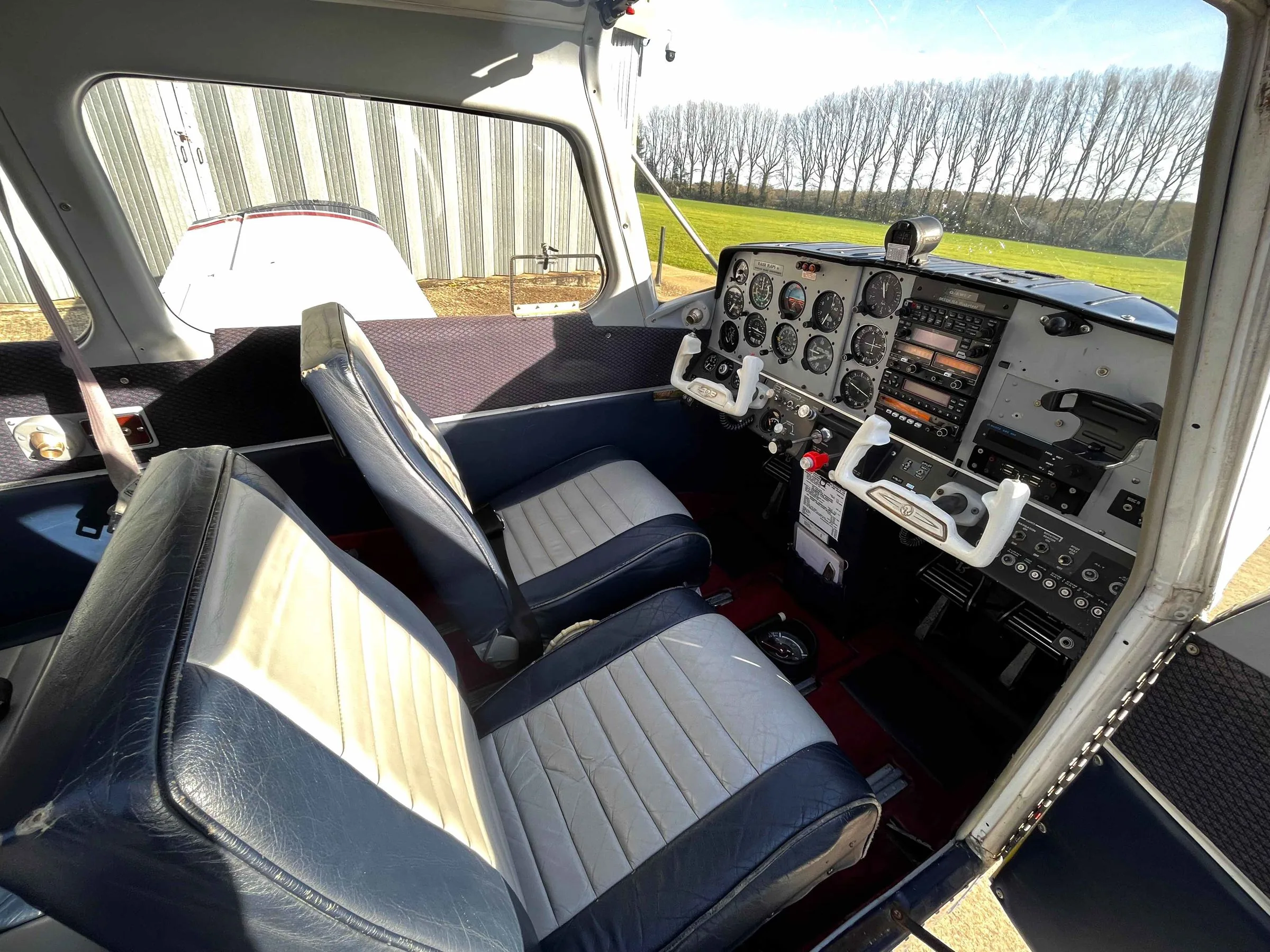 Cockpit and instrument panel of a 1968 Beechcraft 19A Musketeer Sport.