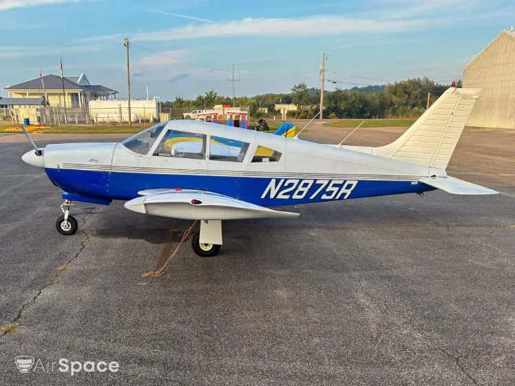 Exterior view of a 1969 Piper PA-28R-200 Arrow, N2875R.
