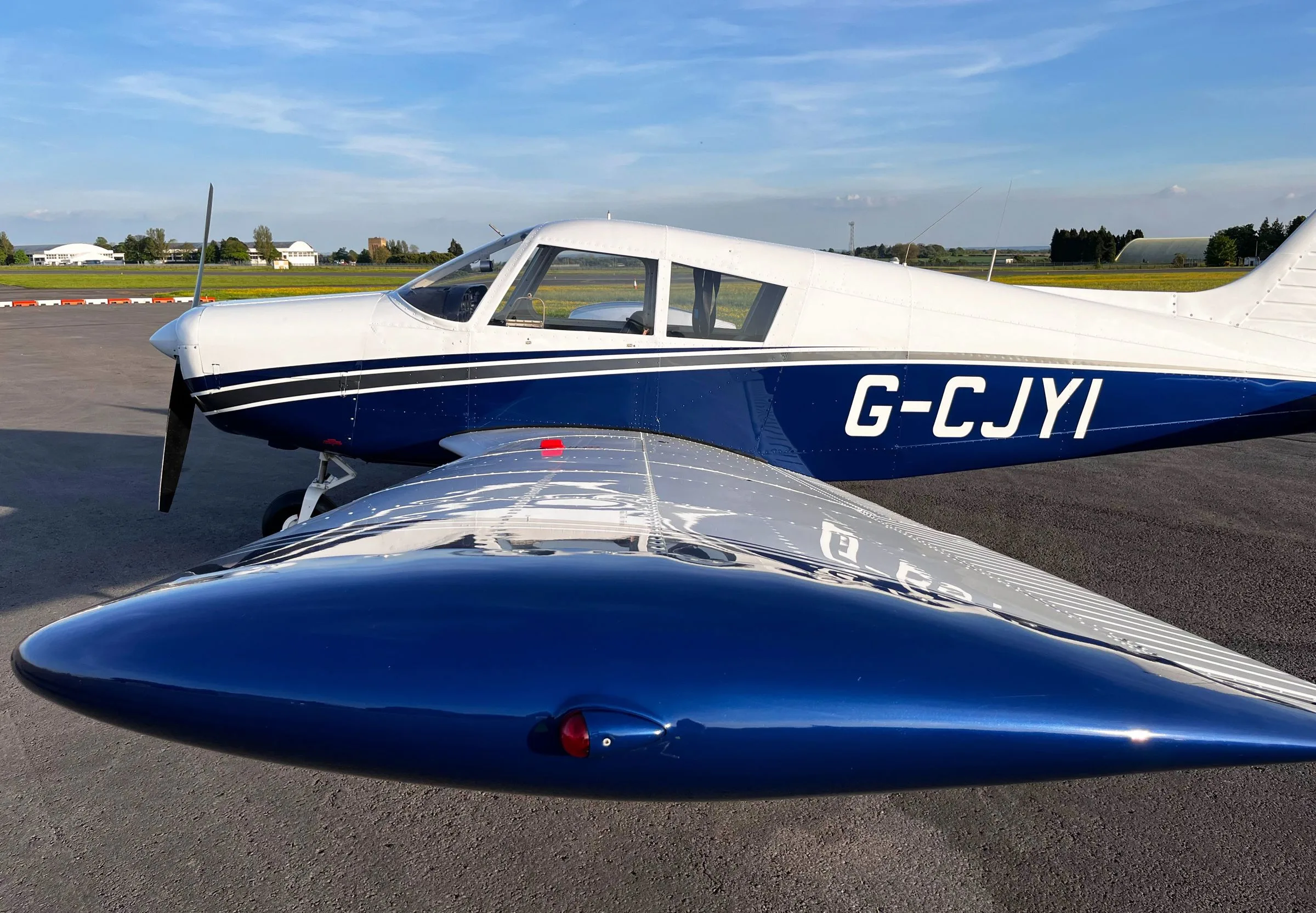 Marketing image of a 1971 Piper PA-28-140 Cherokee.