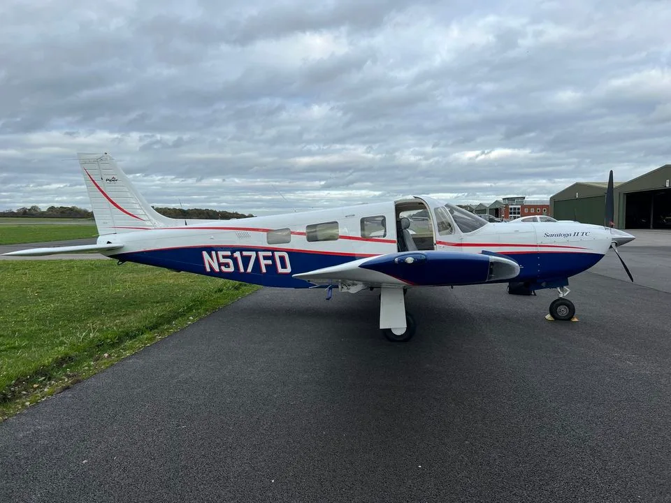 Exterior view of a 2001 Piper PA-32R-301T Saratoga 2 TC, N517FD.