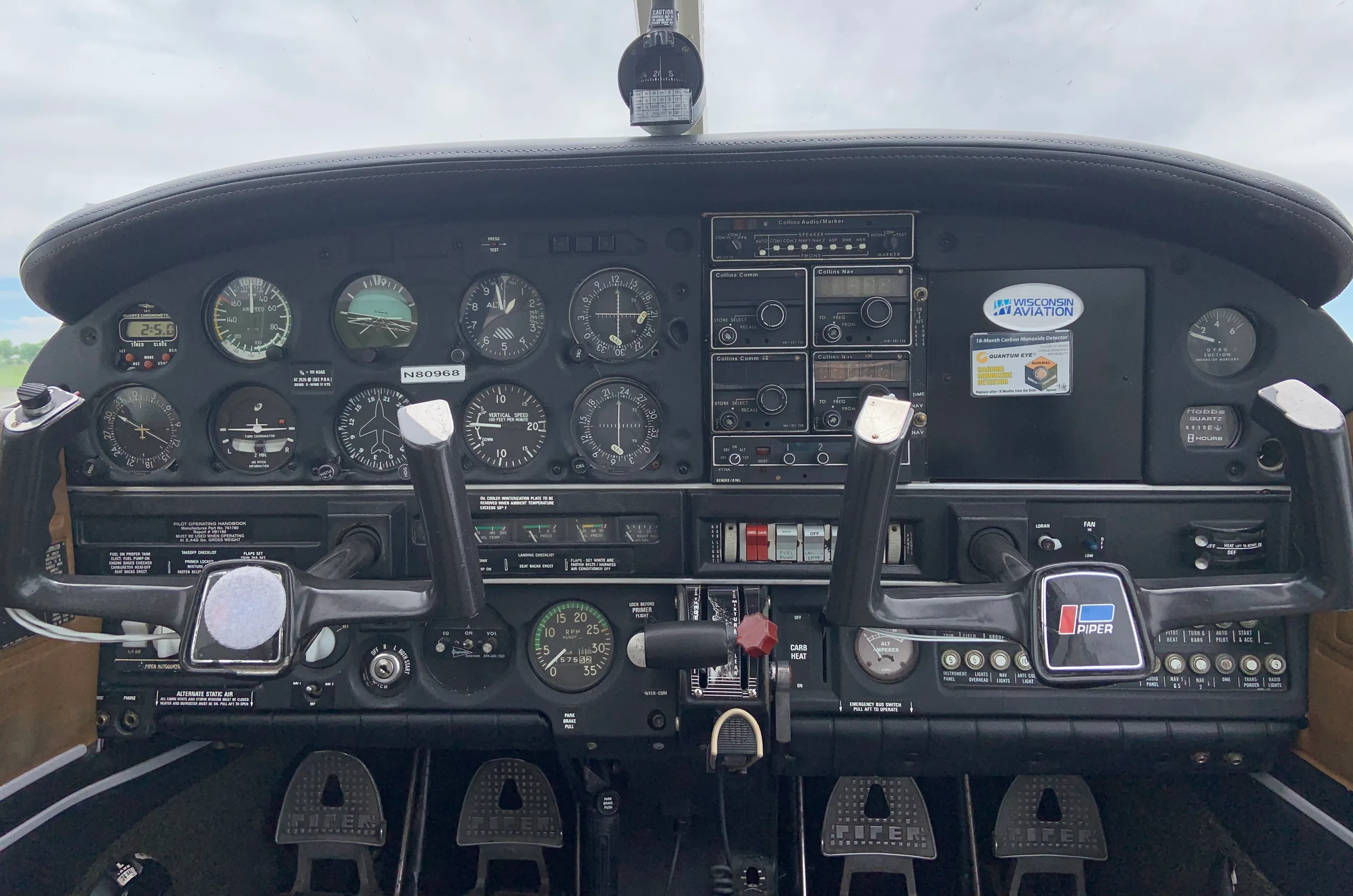 Cockpit and instrument panel of a Piper Warrior.