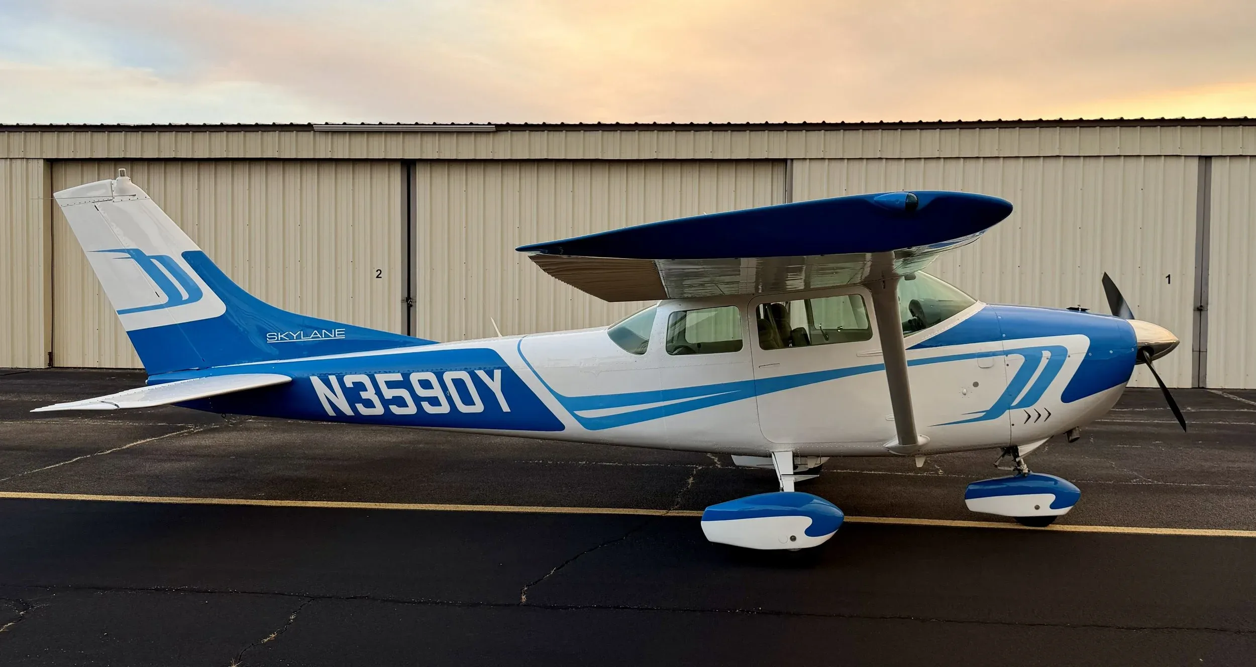 Exterior view of a 1963 Zane Co Aero 182F SKYLANE, N3590Y.