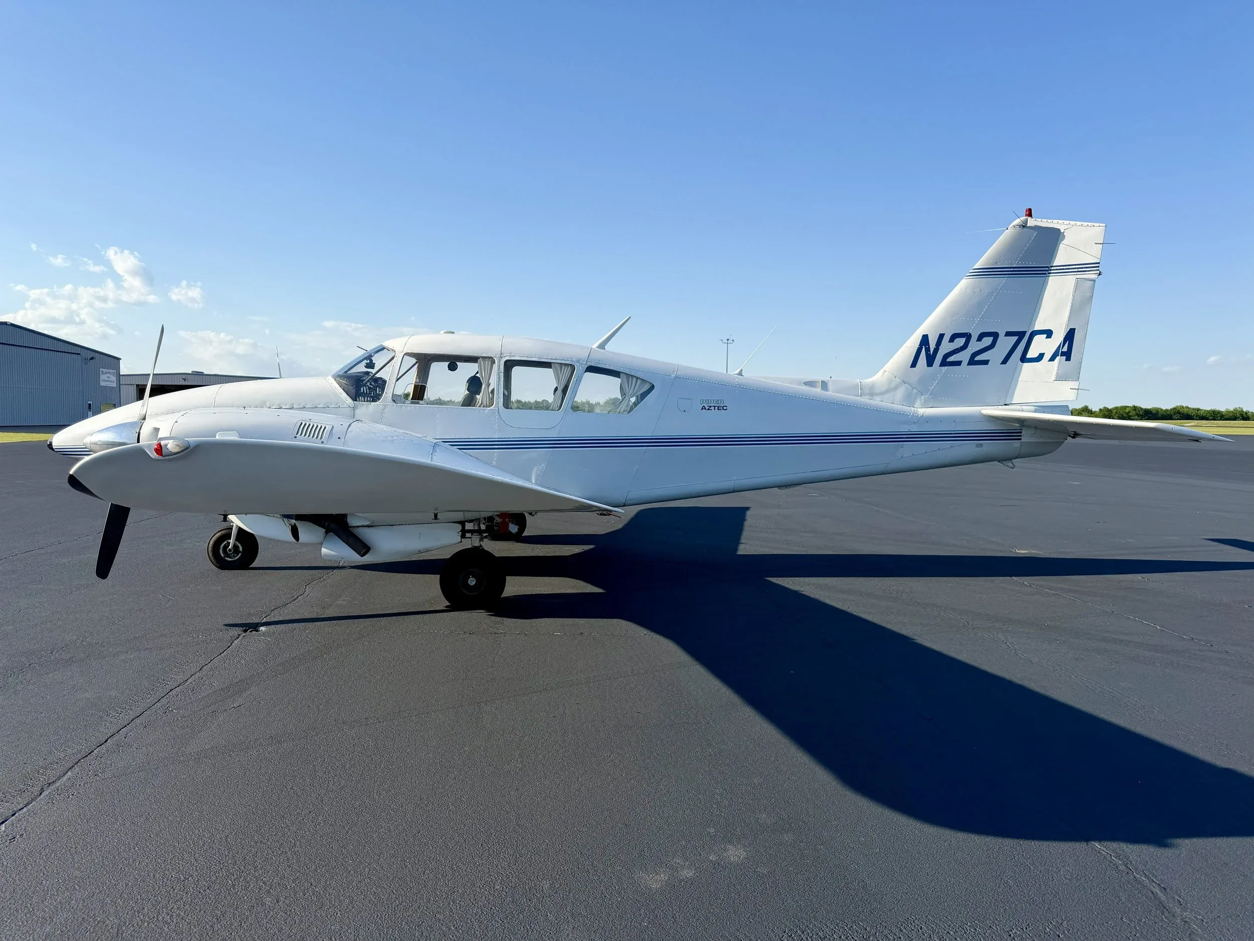 Exterior view of a 1971 Zane Co Aero TURBO AZTEC E N227CA — Zane Co Aero, N227CA.