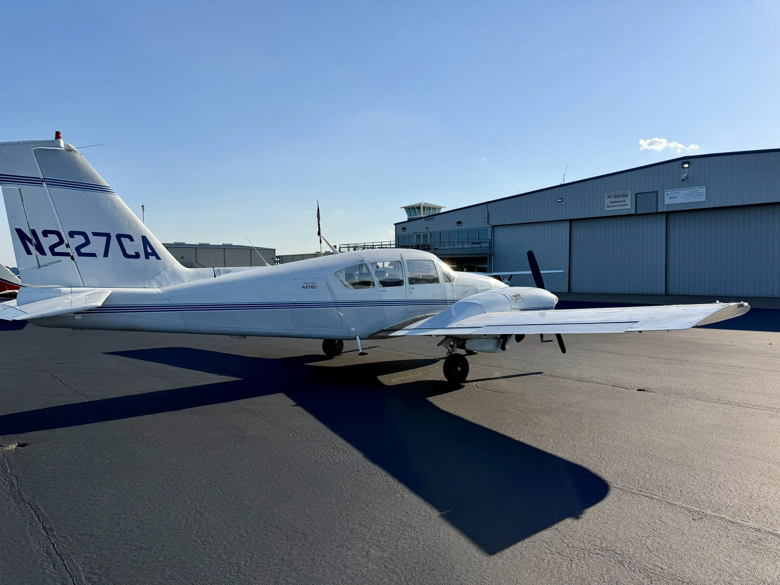 Exterior view of a 1971 Zane Co Aero TURBO AZTEC E N227CA — Zane Co Aero, N227CA.