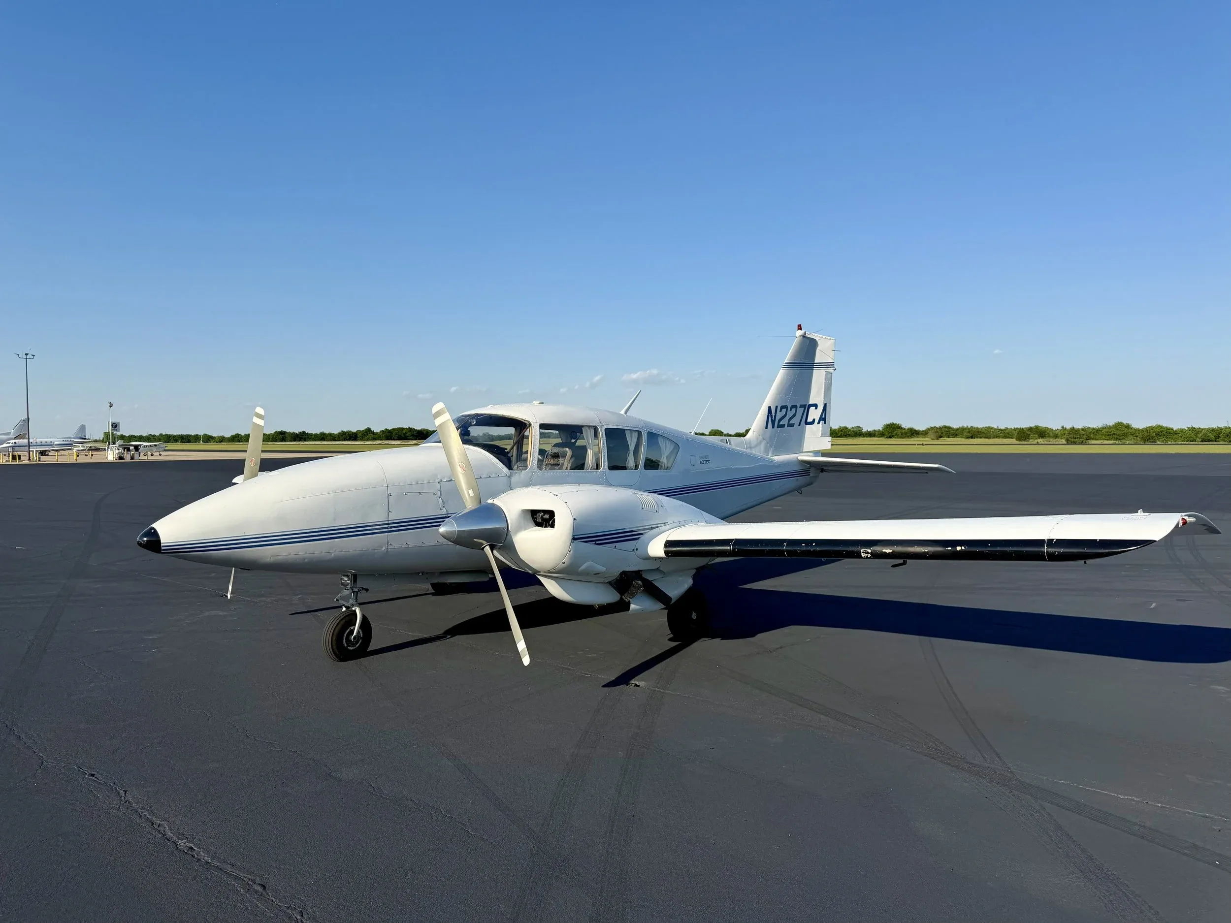 Exterior view of a 1971 Zane Co Aero TURBO AZTEC E N227CA — Zane Co Aero, N227CA.