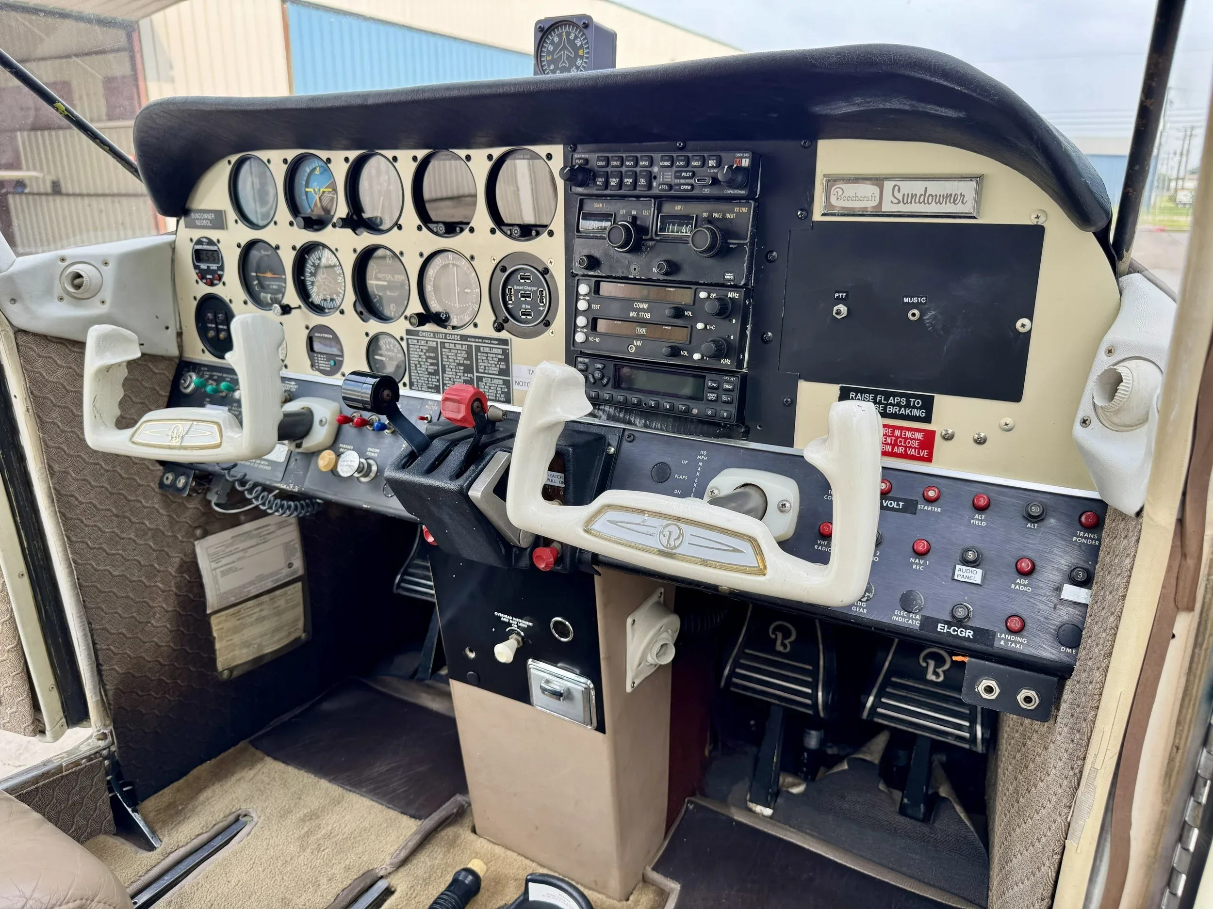 Cockpit and instrument panel of a 1976 Zane Co Aero C23 SUNDOWNER N2050L — Zane Co Aero.