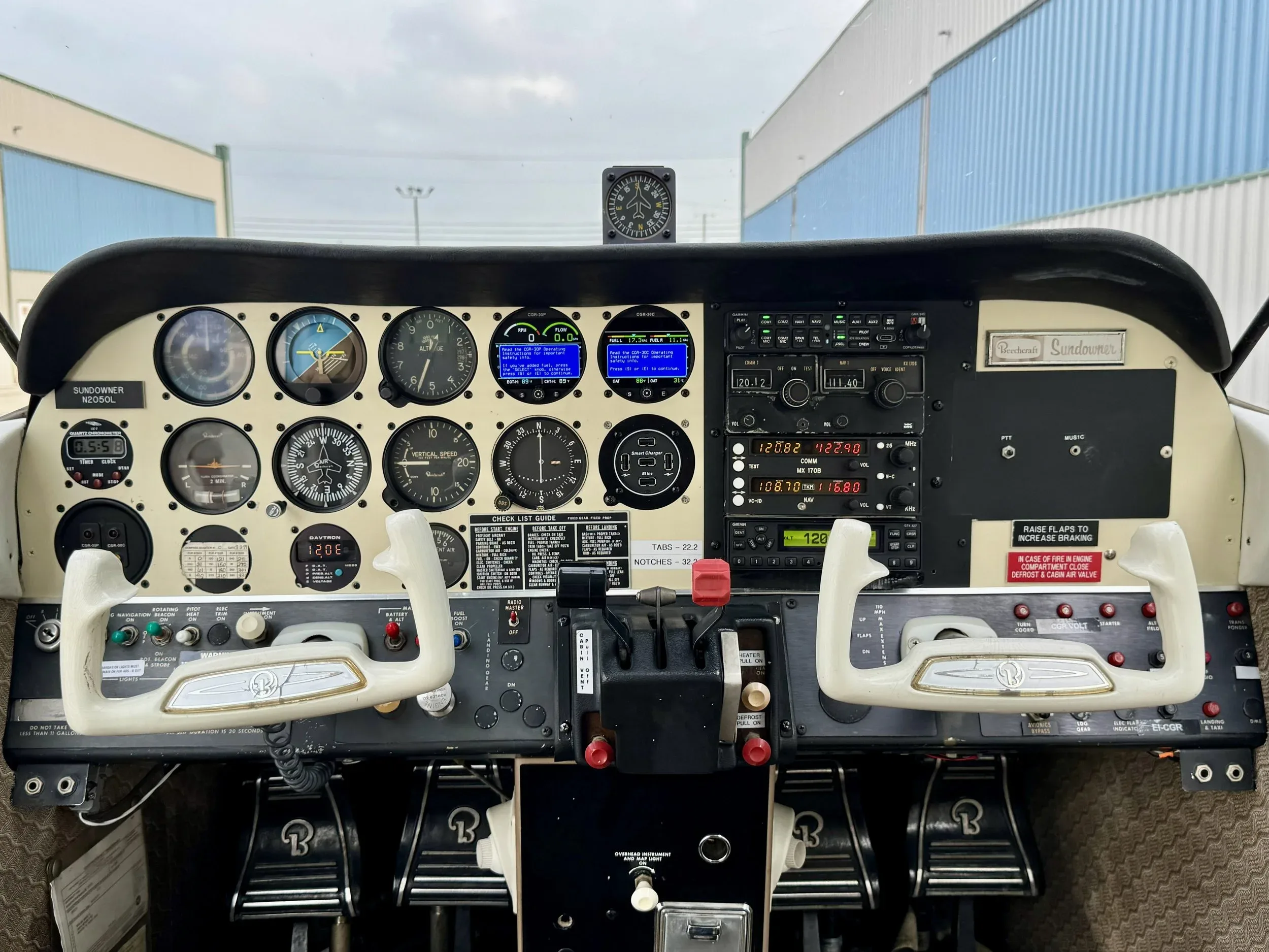 Cockpit and instrument panel of a 1976 Zane Co Aero C23 SUNDOWNER N2050L — Zane Co Aero.