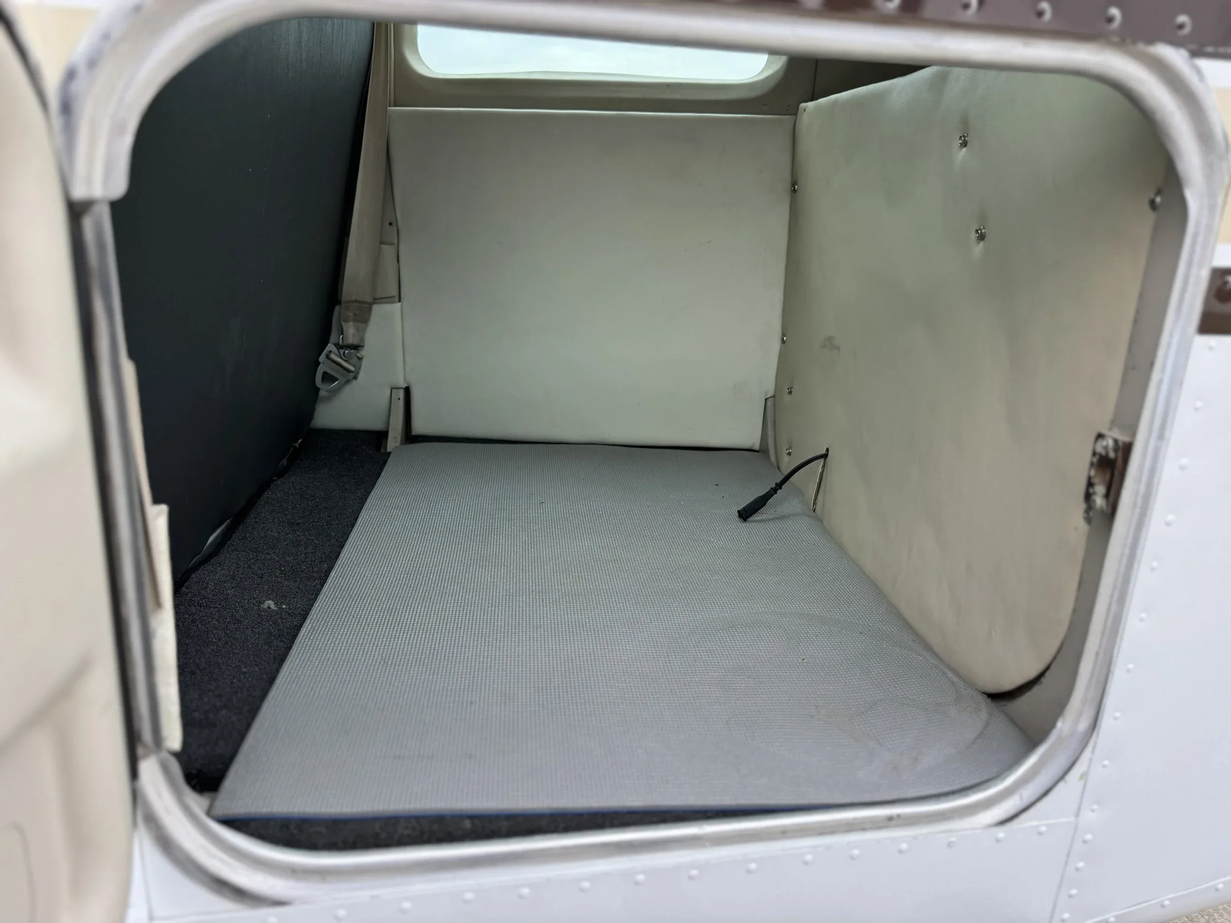 Cabin interior of a 1980 Zane Co Aero Sundowner C23 N707G — Zane Co Aero.