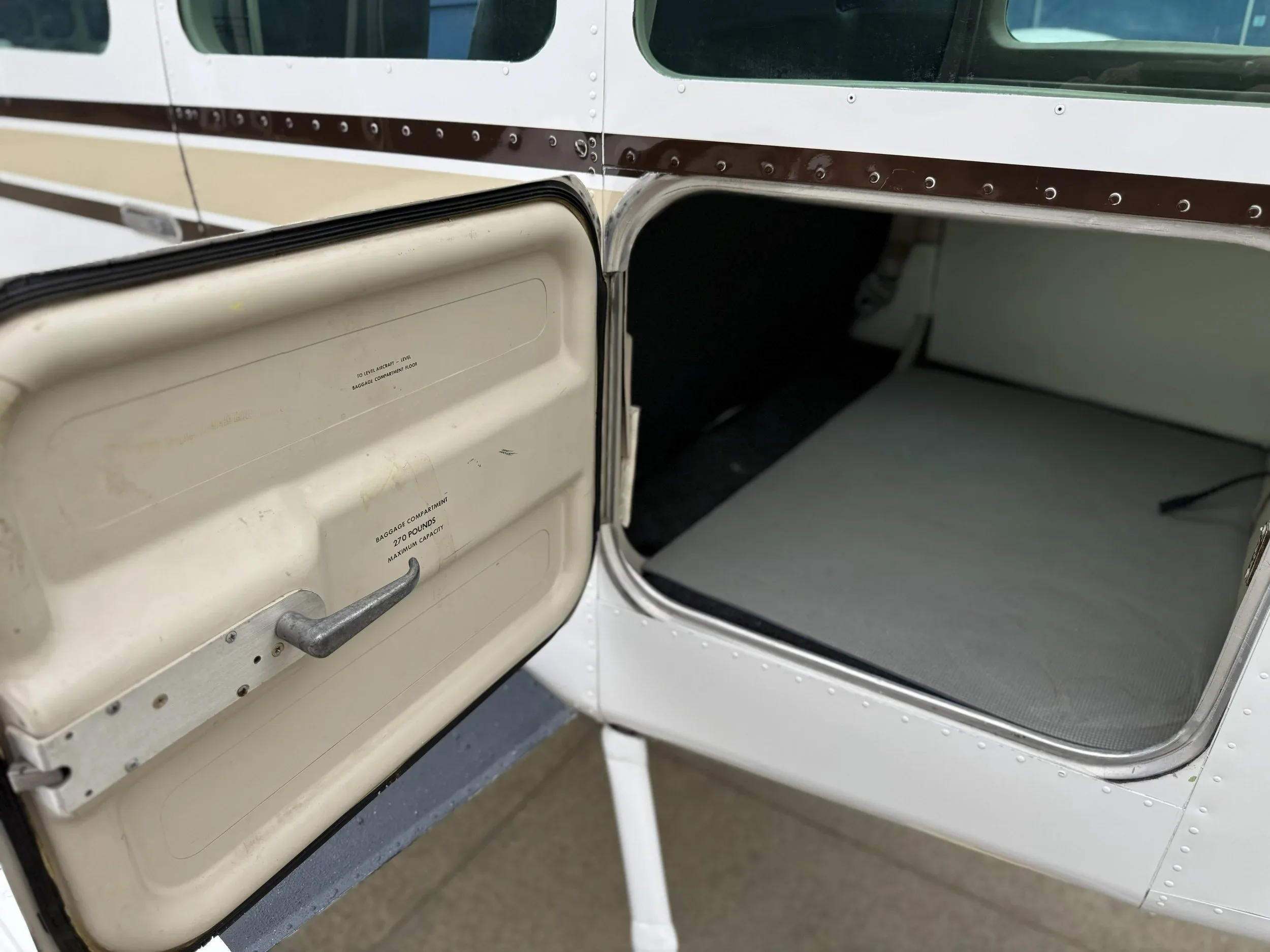 Cabin interior of a 1980 Zane Co Aero Sundowner C23 N707G — Zane Co Aero.