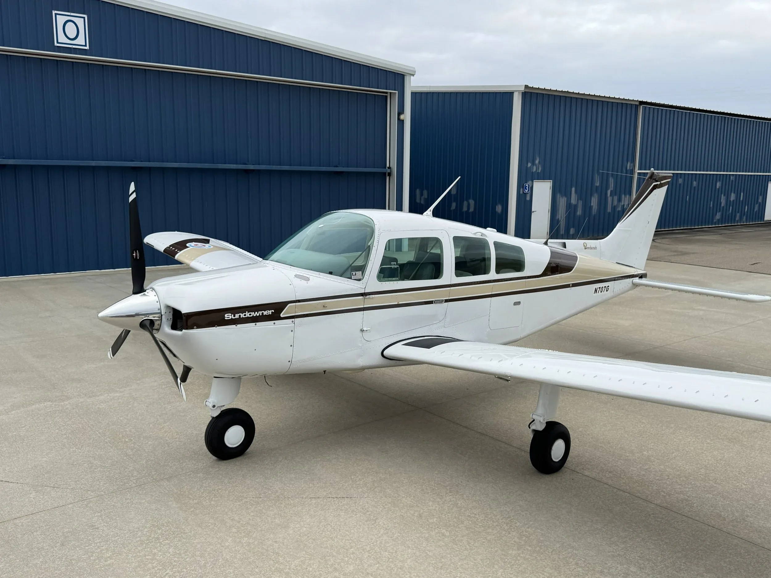 Exterior view of a 1980 Zane Co Aero Sundowner C23 N707G — Zane Co Aero, N707G.