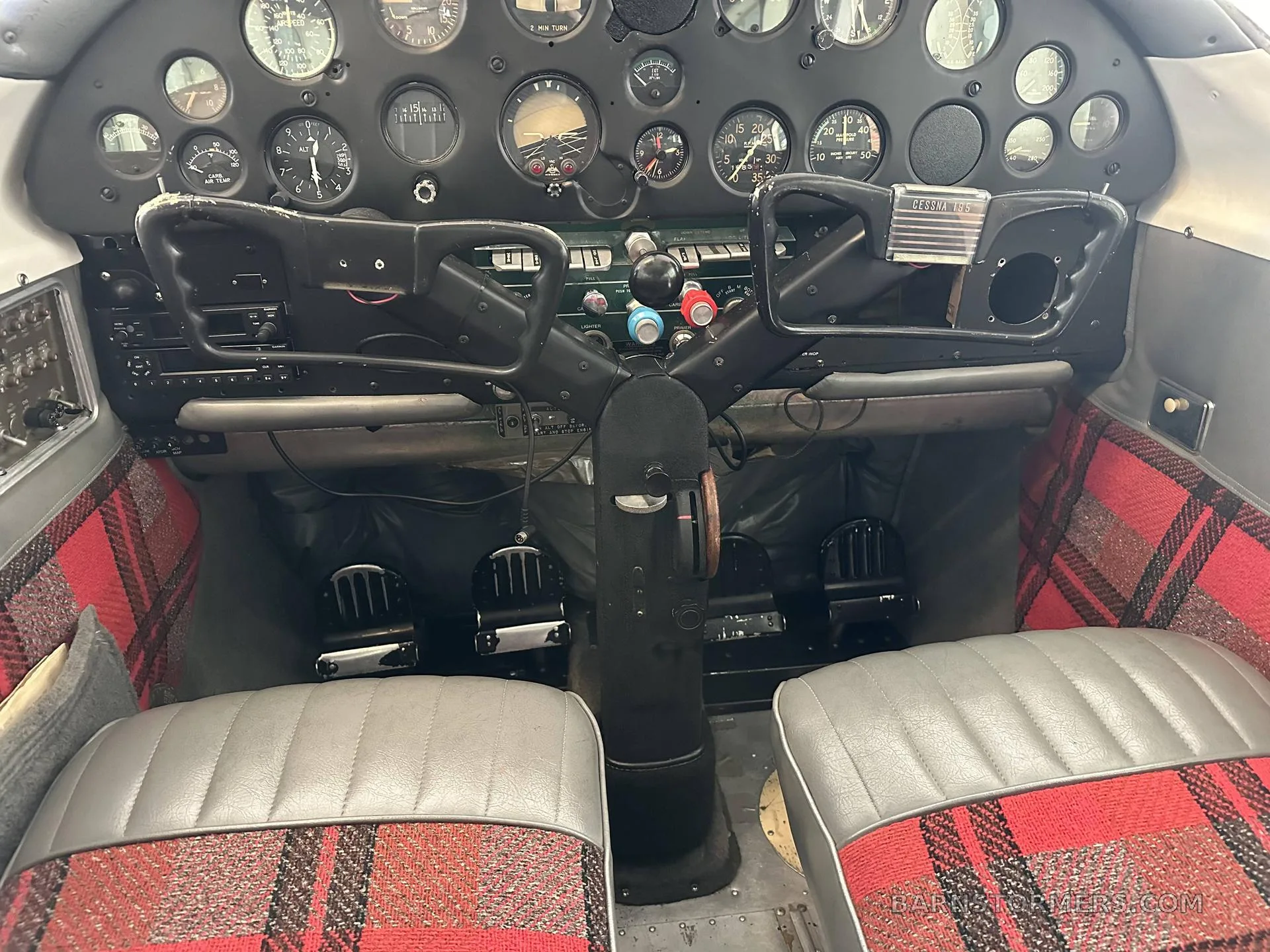 Cockpit and instrument panel of a 1953 Cessna 195.