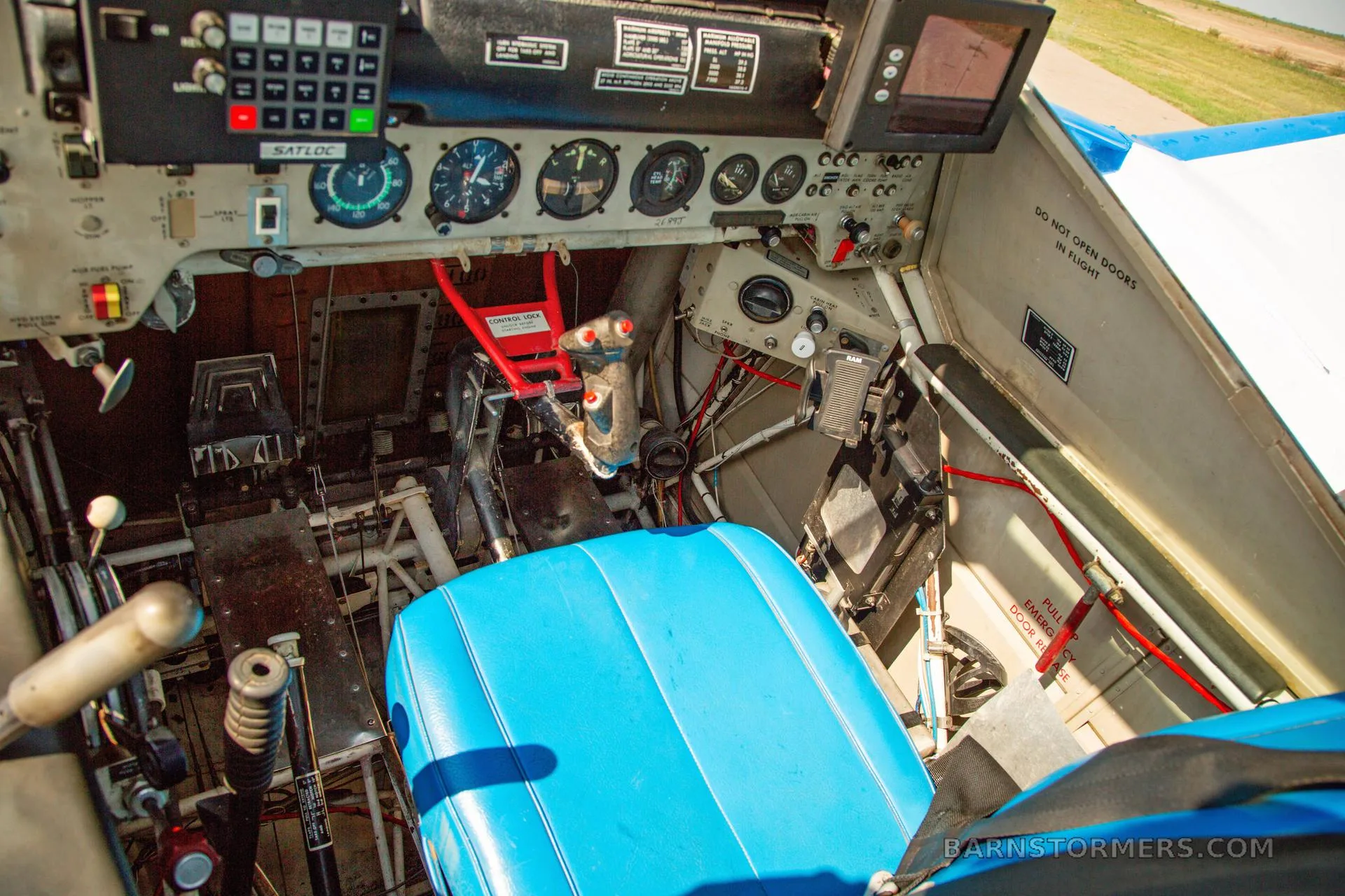 Cockpit and instrument panel of a 1979 Ag HUSKY FOR SALE.