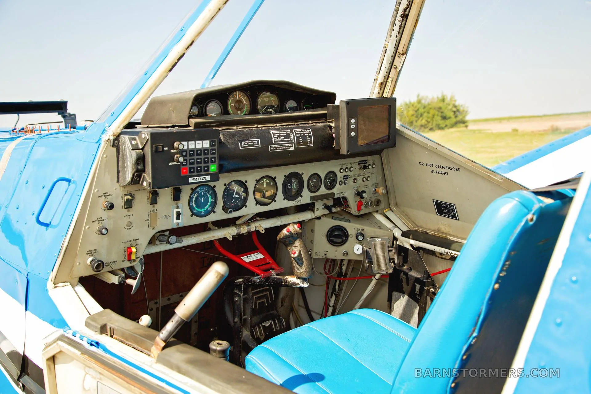 Cockpit and instrument panel of a 1979 Ag HUSKY FOR SALE.