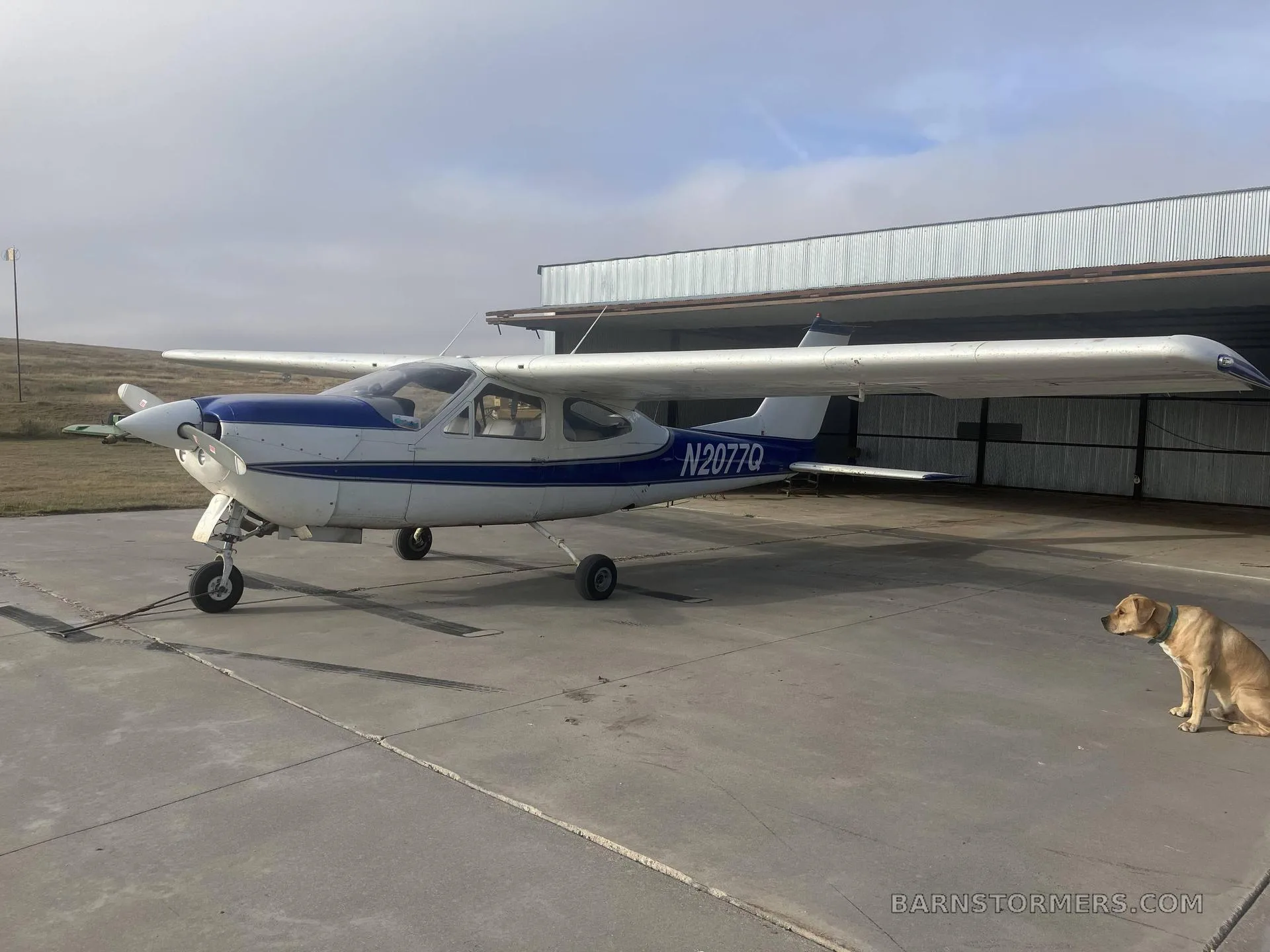 Exterior view of a 1973 Cessna 177RG, N2077Q.