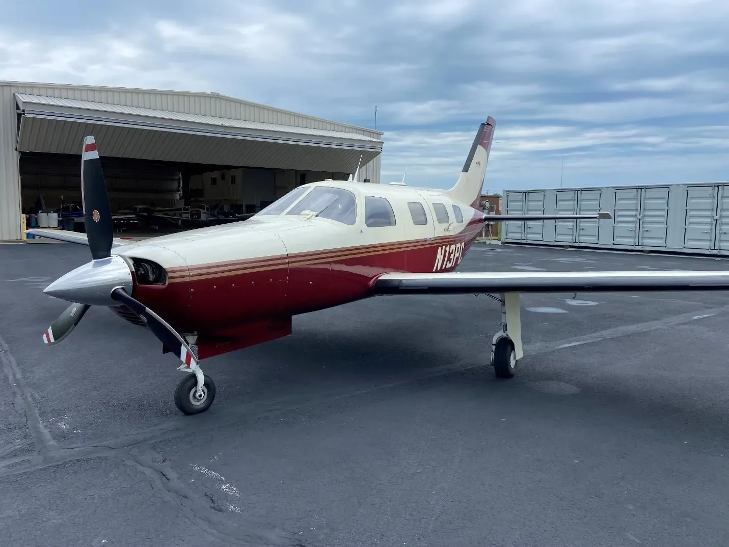 Exterior view of a 1984 Piper M 350, N13PC.
