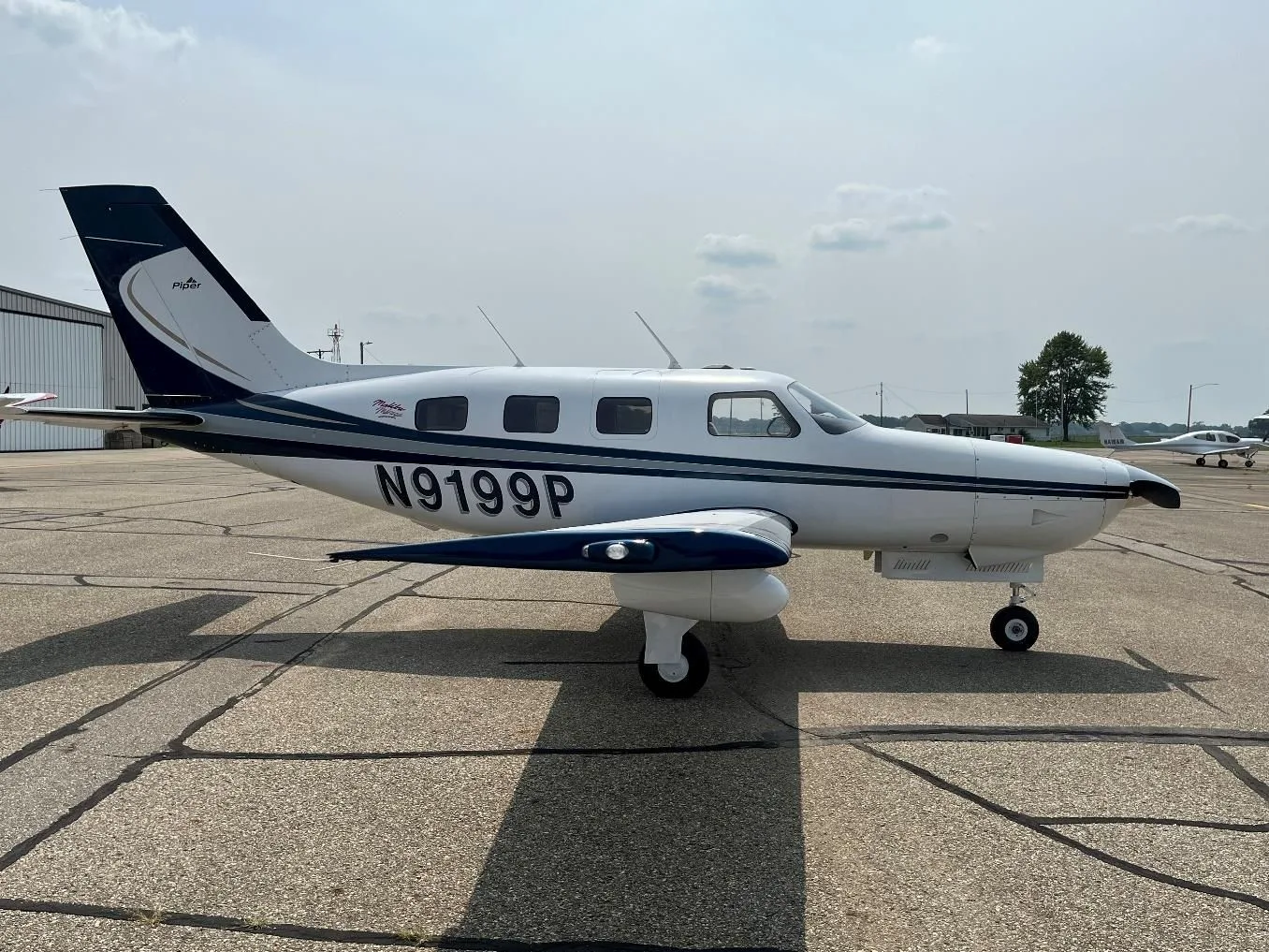 Exterior view of a Piper PA 46 350P Mirage, N9199P.