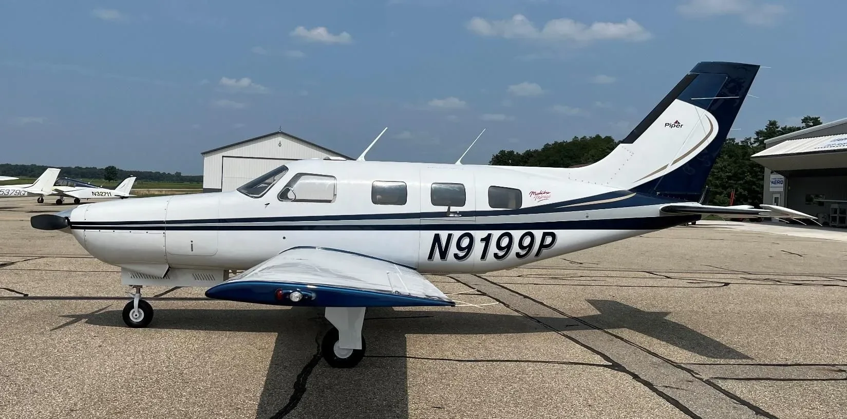 Exterior view of a Piper PA 46 350P Mirage, N9199P.