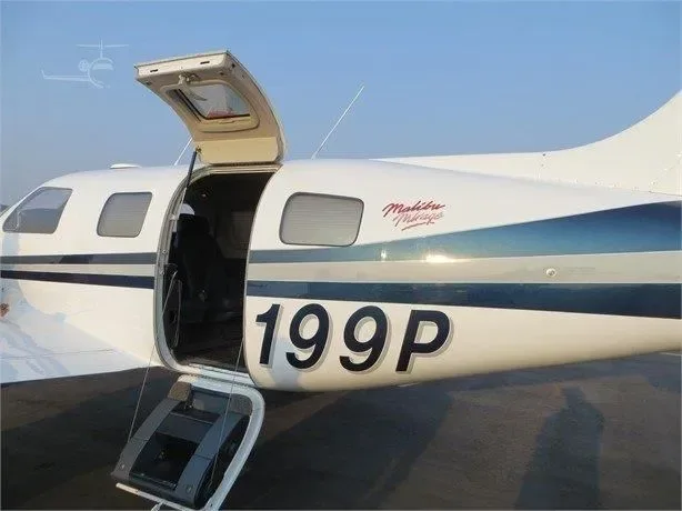 Exterior view of a Piper PA 46 350P Mirage, N9199P.