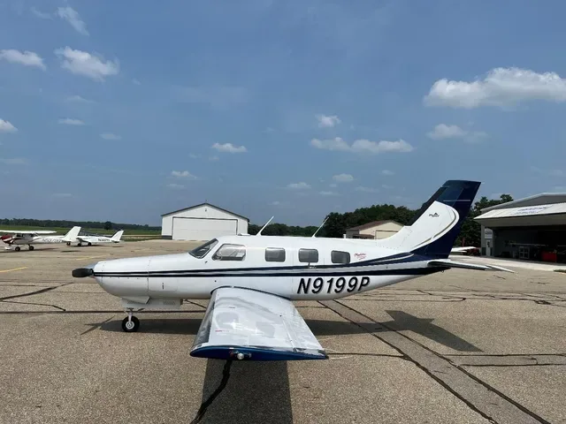 Exterior view of a Piper PA 46 350P Mirage, N9199P.