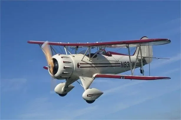 Marketing image of a WACO YMF 5C.