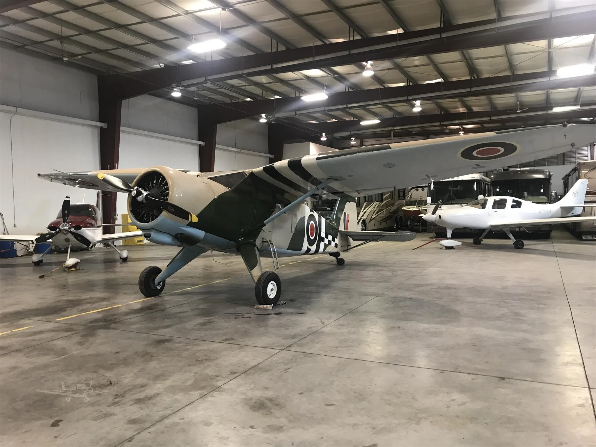 Exterior view of a 1943 STINSON V77 GULLWING, C-GLWI.