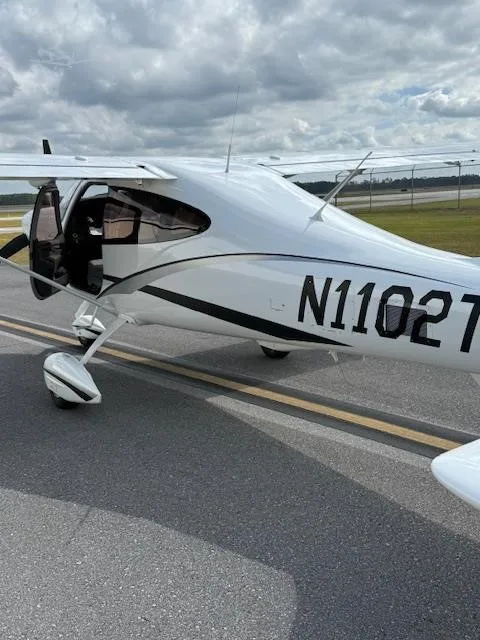 Exterior view of a 2021 TECNAM P2010, N1102T.