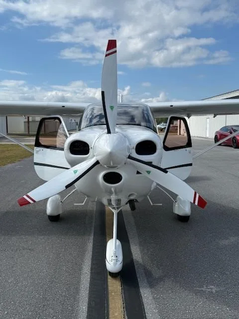 Exterior view of a 2021 TECNAM P2010, N1102T.